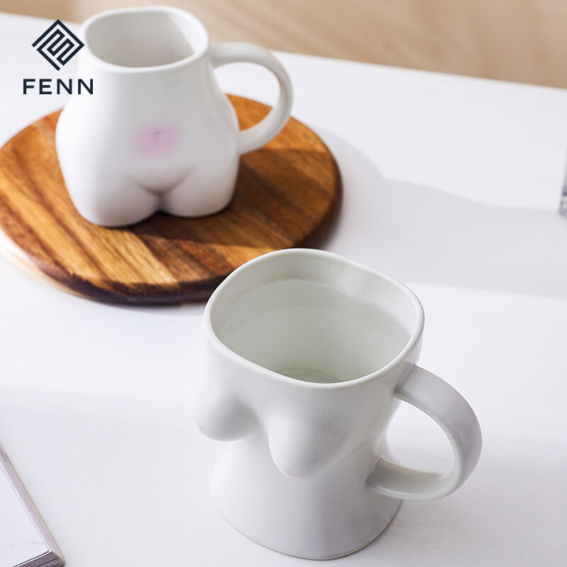 Nordic Style Decorative Stylish Body Shaped Ceramic Cups Artistic Design Coffee Mug / Porcelain Matte White Ceramic Mug factory