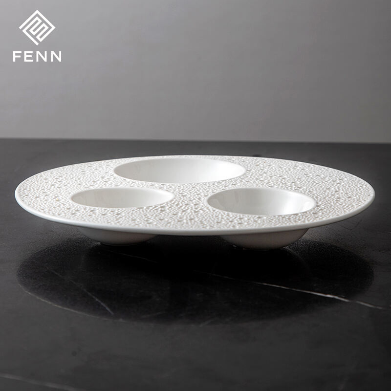 Unique Shape Nordic White Porcelain Egg Shape Lunar Surface Soup Platter Hotel Restaurant Used Wholesa Ceramic Appetizer plate supplier