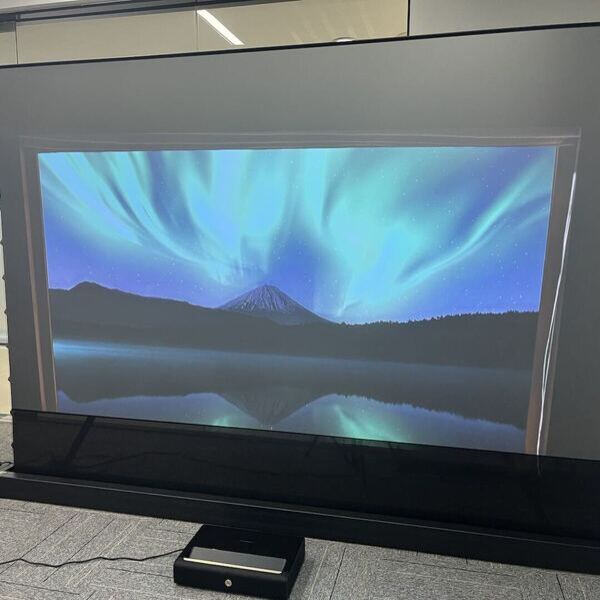 Elevate your viewing experience with a state-of-the-art floor rising projector screen
