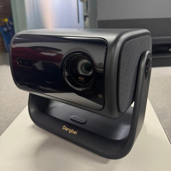 Create a home theater experience with a mobile projector and screen
