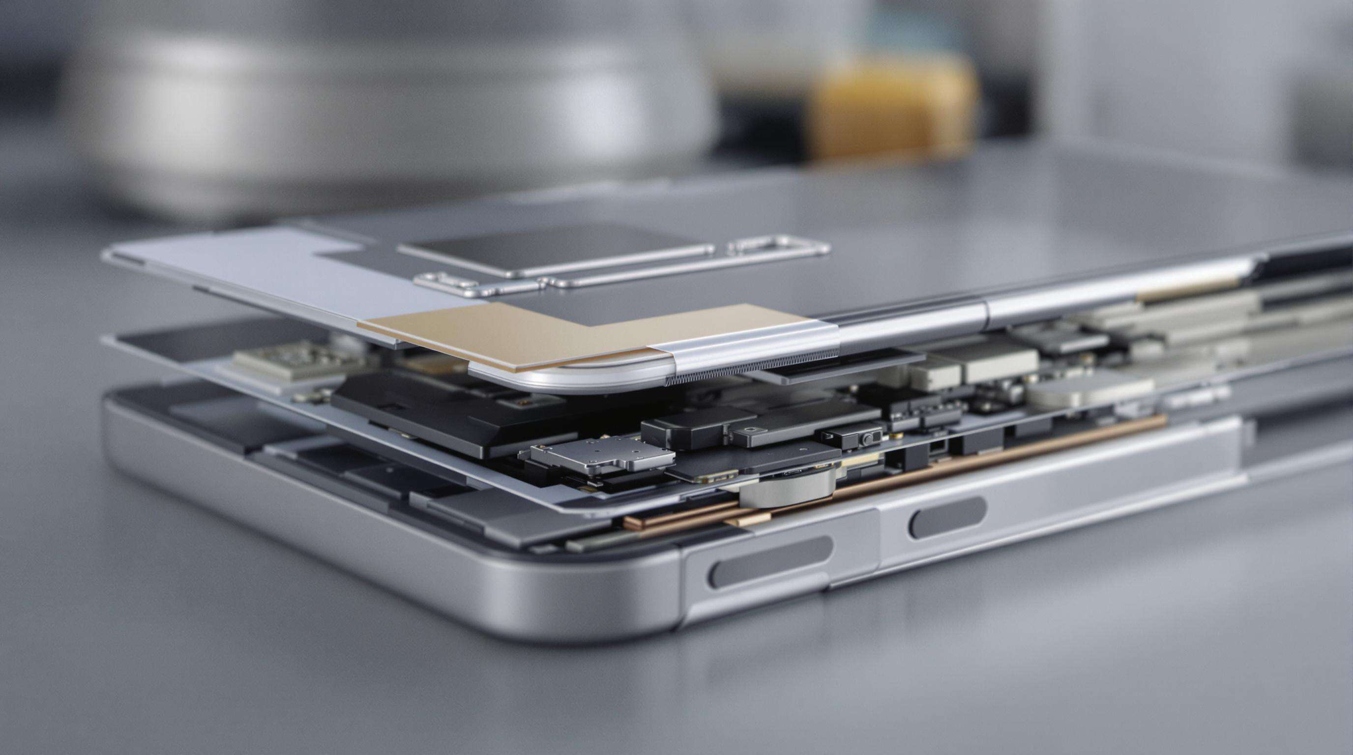 Macro cross-section of smartphone showing thin adhesive tape bonding display and hinge components