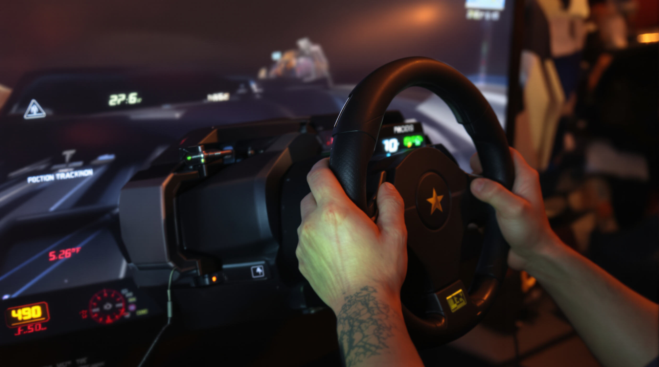 Player using arcade simulator with haptic sensors and motion tracking equipment in a gaming center