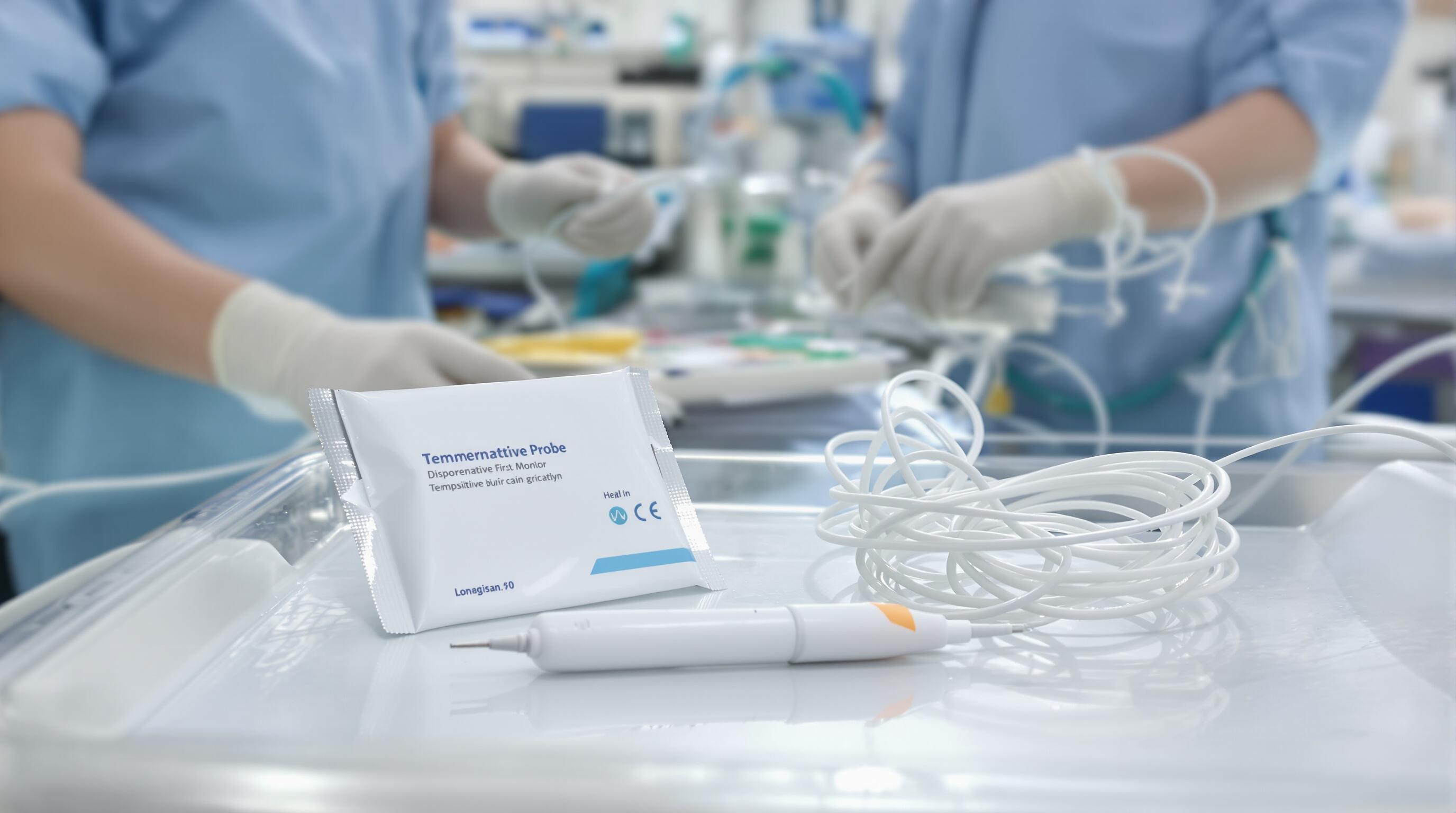 ICU nurses preparing disposable temperature probes in a sterile hospital setting