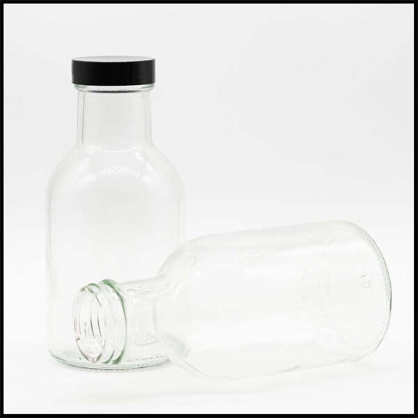 Здоровые и устойчивые стеклянные бутылки для питья с крышками