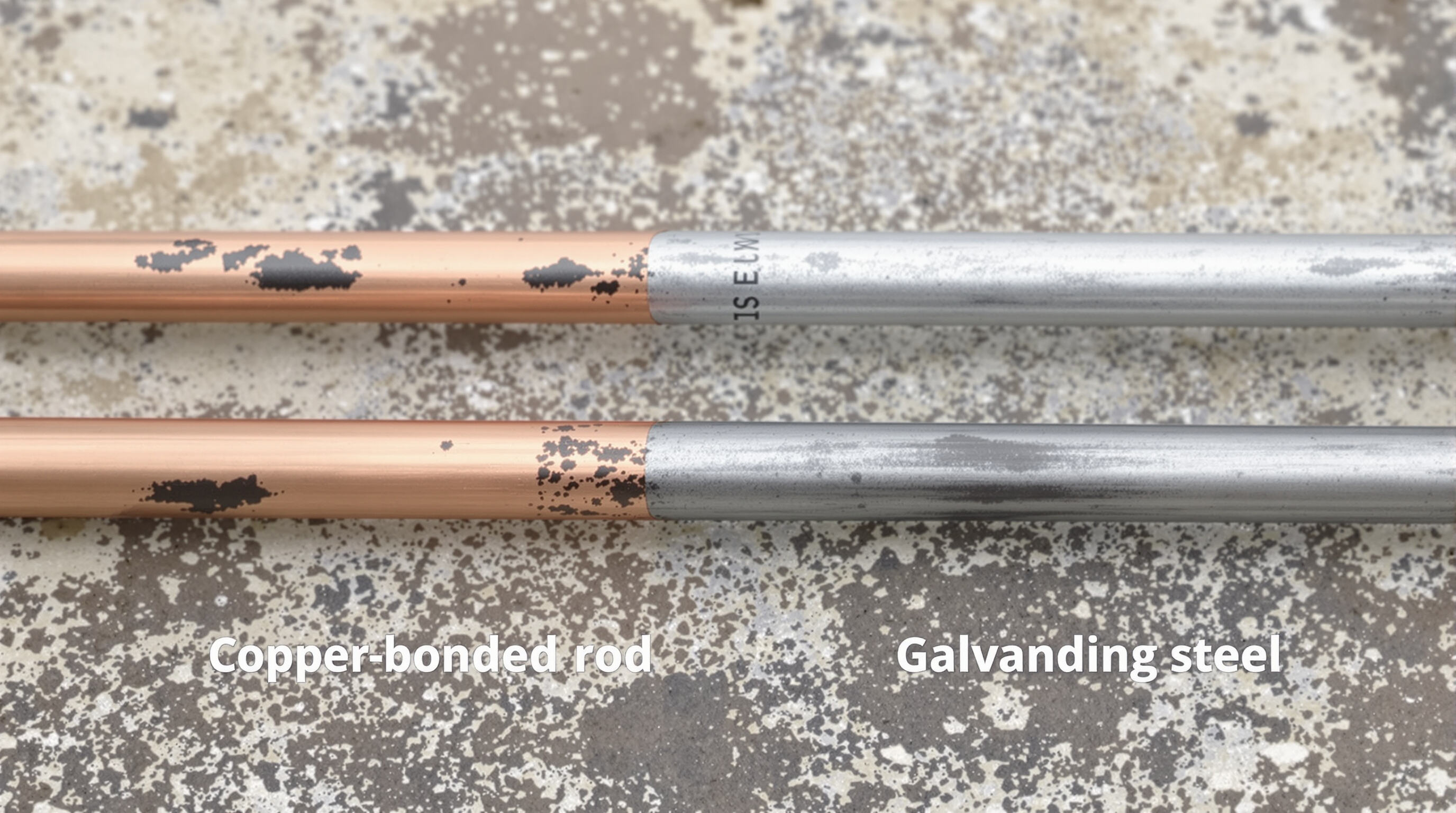 Copper-bonded and galvanized steel grounding rods side by side, highlighting corrosion differences.
