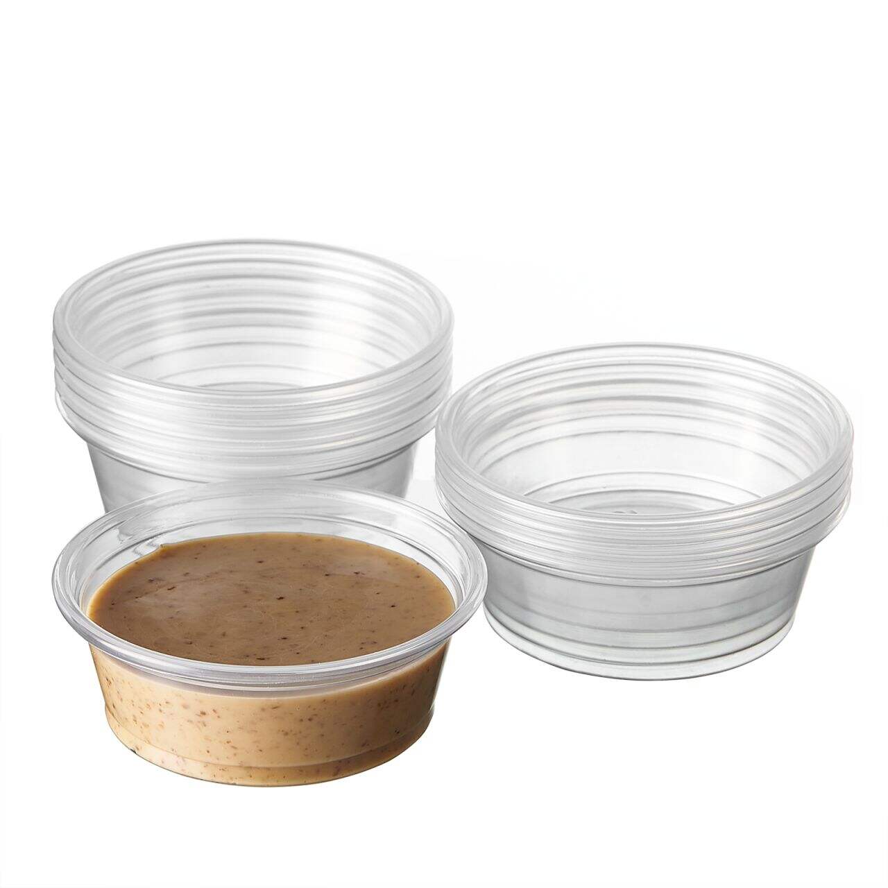 Ingen mer oreda med utrinnanden när du har en plastmugg för sås på bordet