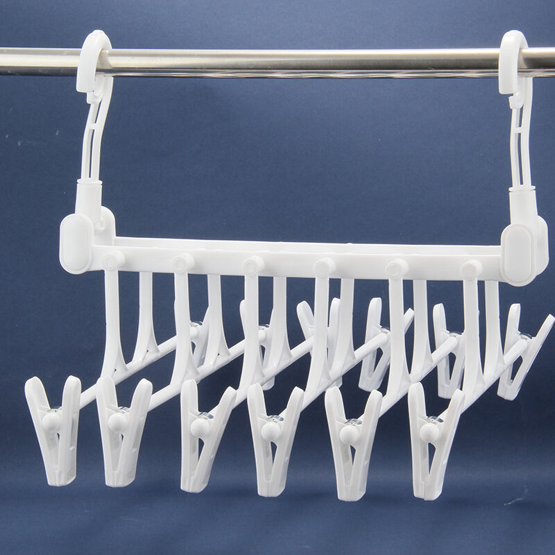 Wardrobe Plastic Pants Rack Multifunctional Foldable Clip Hanger Living Room Plastic Clothes Rack supplier