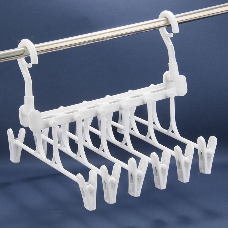 Wardrobe Plastic Pants Rack Multifunctional Foldable Clip Hanger Living Room Plastic Clothes Rack supplier