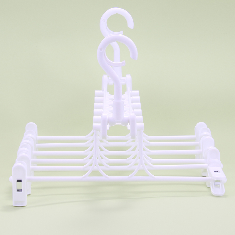 Wardrobe Plastic Pants Rack Multifunctional Foldable Clip Hanger Living Room Plastic Clothes Rack supplier