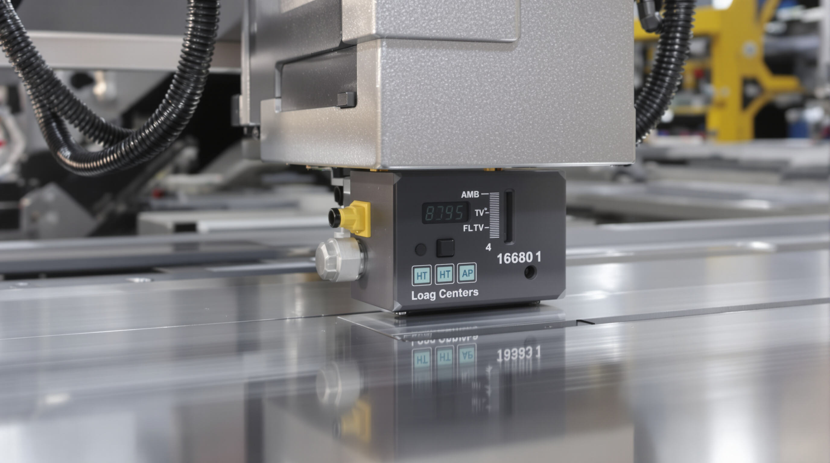 CNC press brake ram applying controlled force to metal with visible integrated sensors