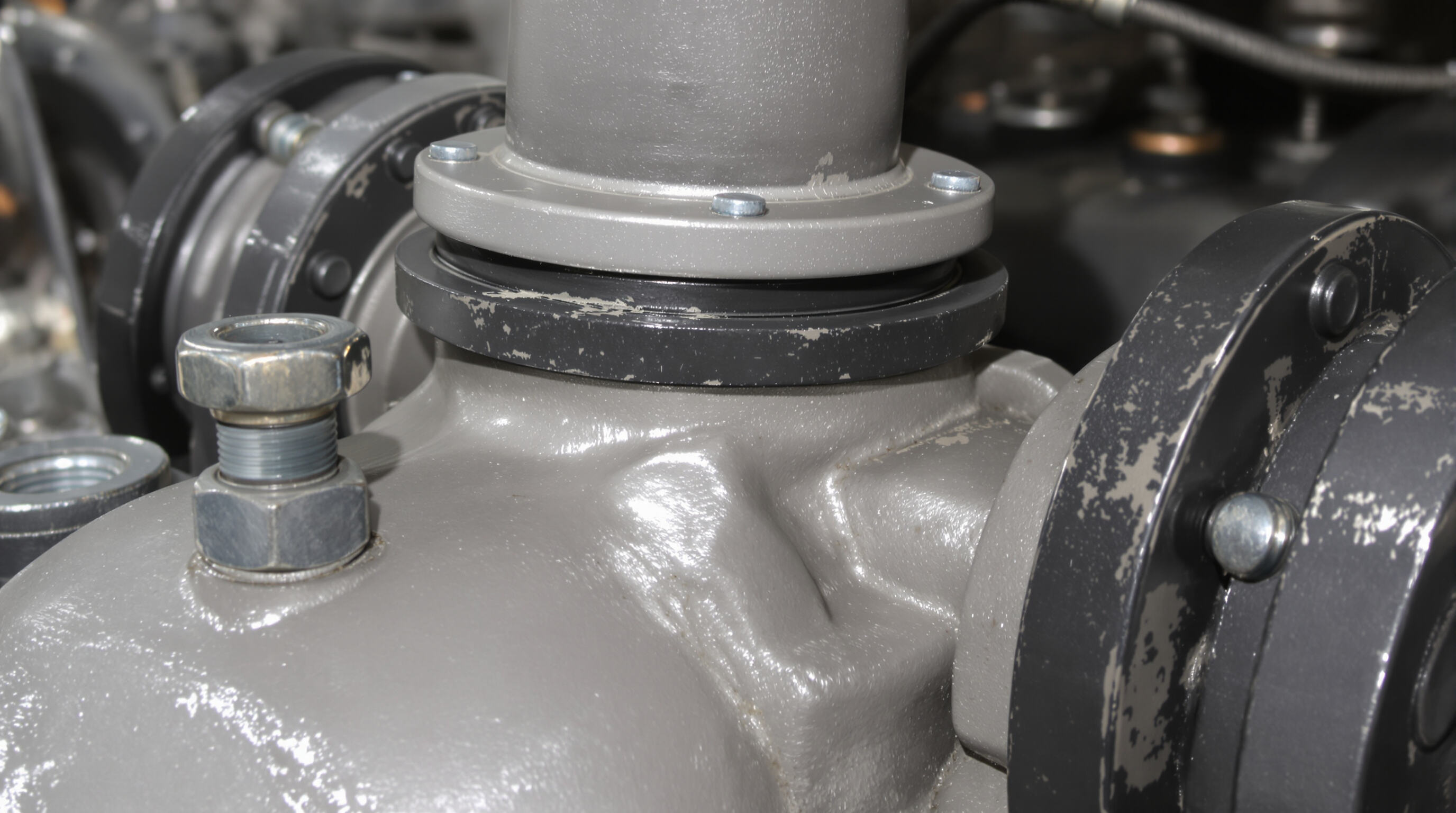 Close-up of pump joints with rubber washers ensuring a tight seal under pressure and vibration
