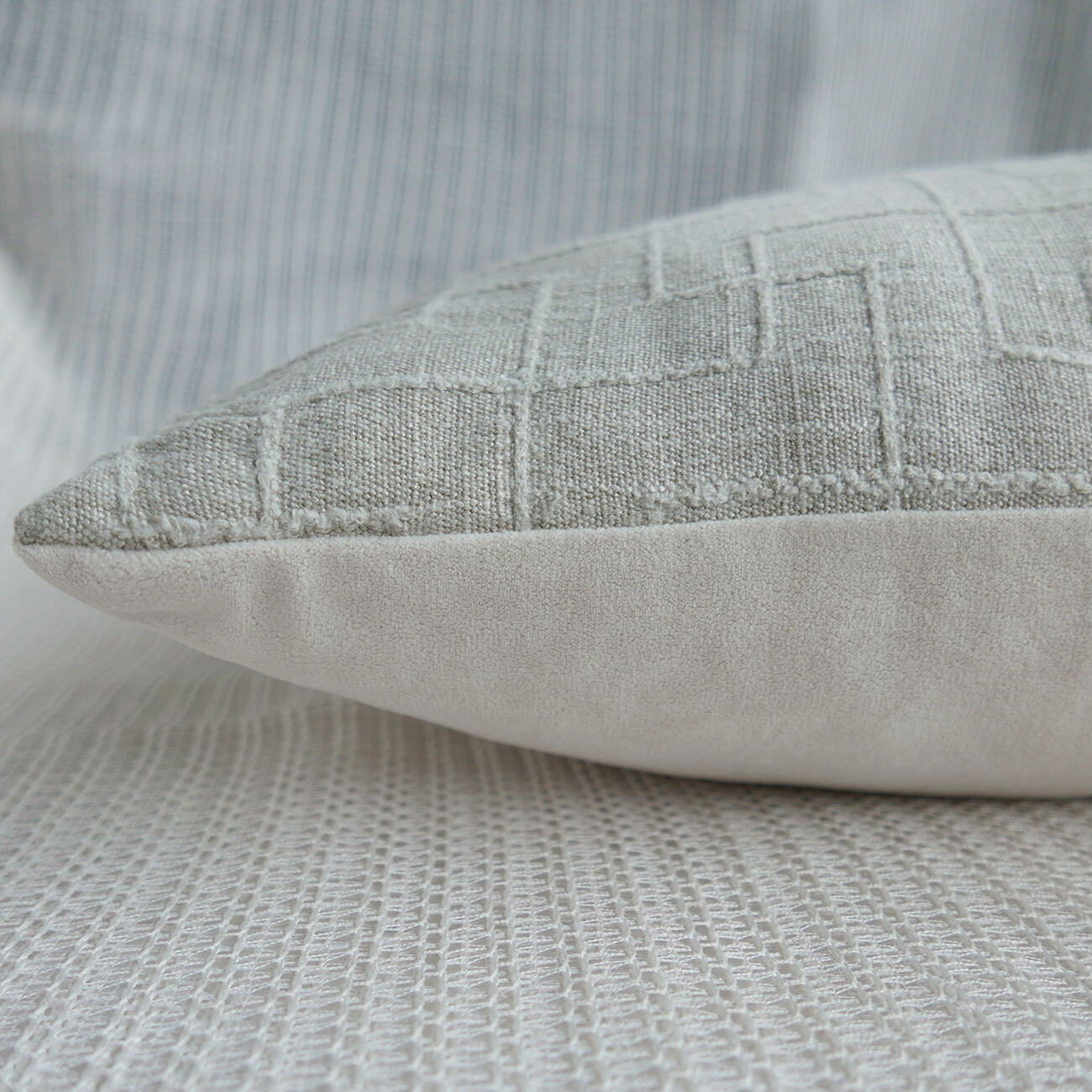 Embossed velvet pillowcase with watermelon red details