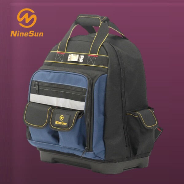 Padded straps and back support for comfortably carrying heavy loads of tools