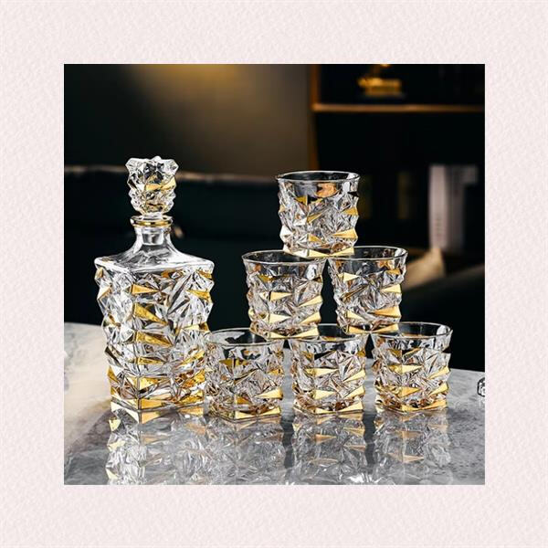 Experience the luxury of serving drinks in crystal decanter and glasses