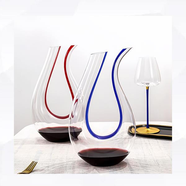 Impress your guests with a stunning wine decanter and glass set at your next dinner party.