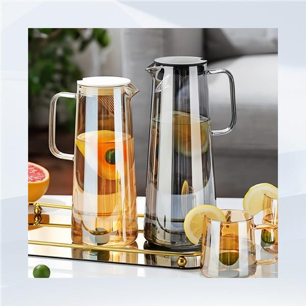 Sleek design meets functionality with a glass water jug featuring a secure lid
