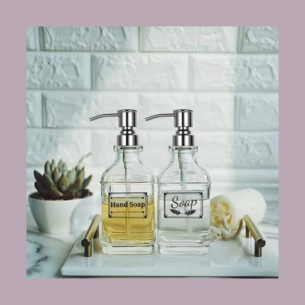 Add an elegant touch to your kitchen sink with a glass hand soap dispenser