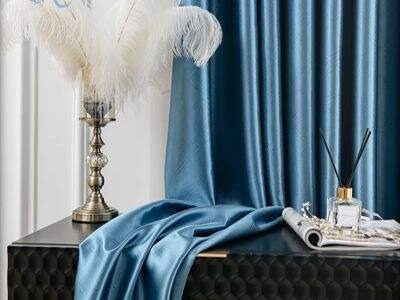 Velvet drapery maintains color match across 50+ rooms using batch-controlled dye lots