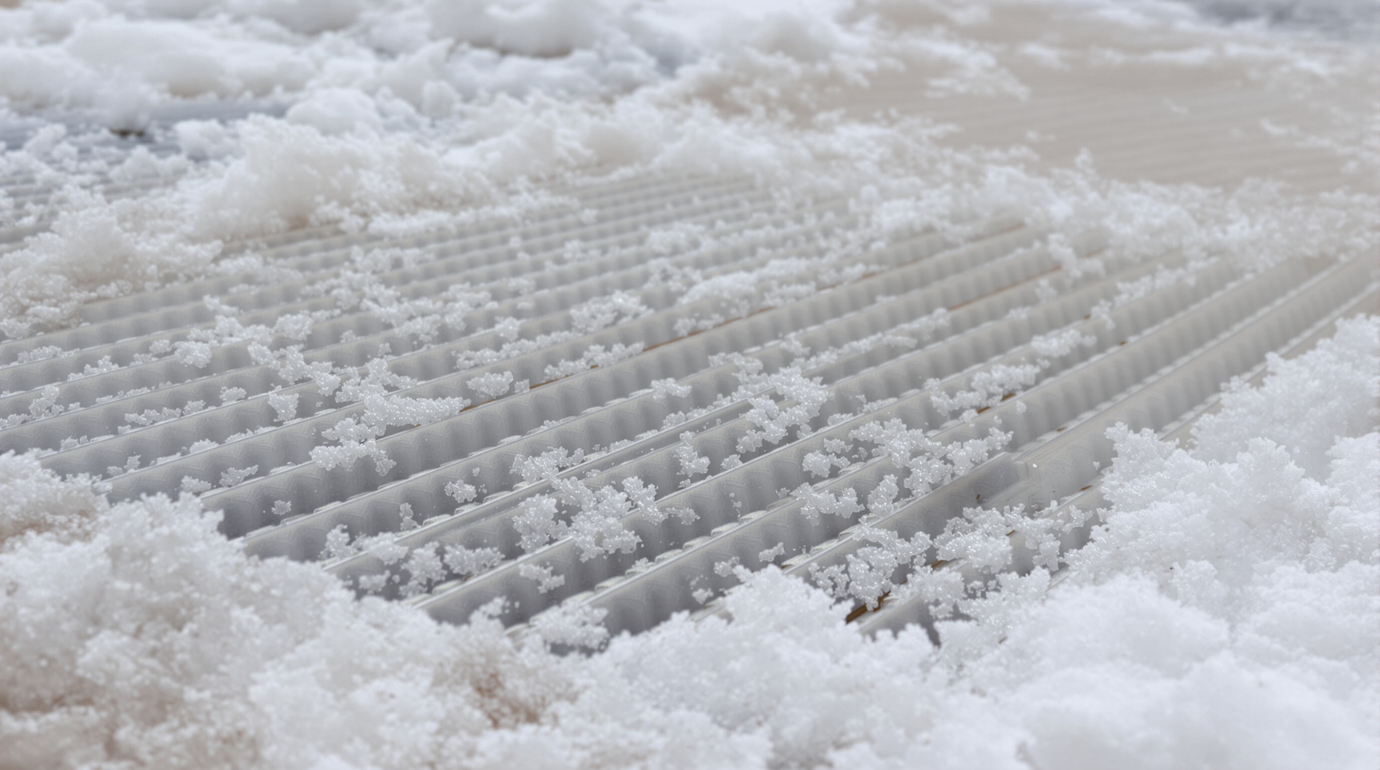 LED display illustrating thermal management, with snow and desert sand highlighting extreme temperature resilience