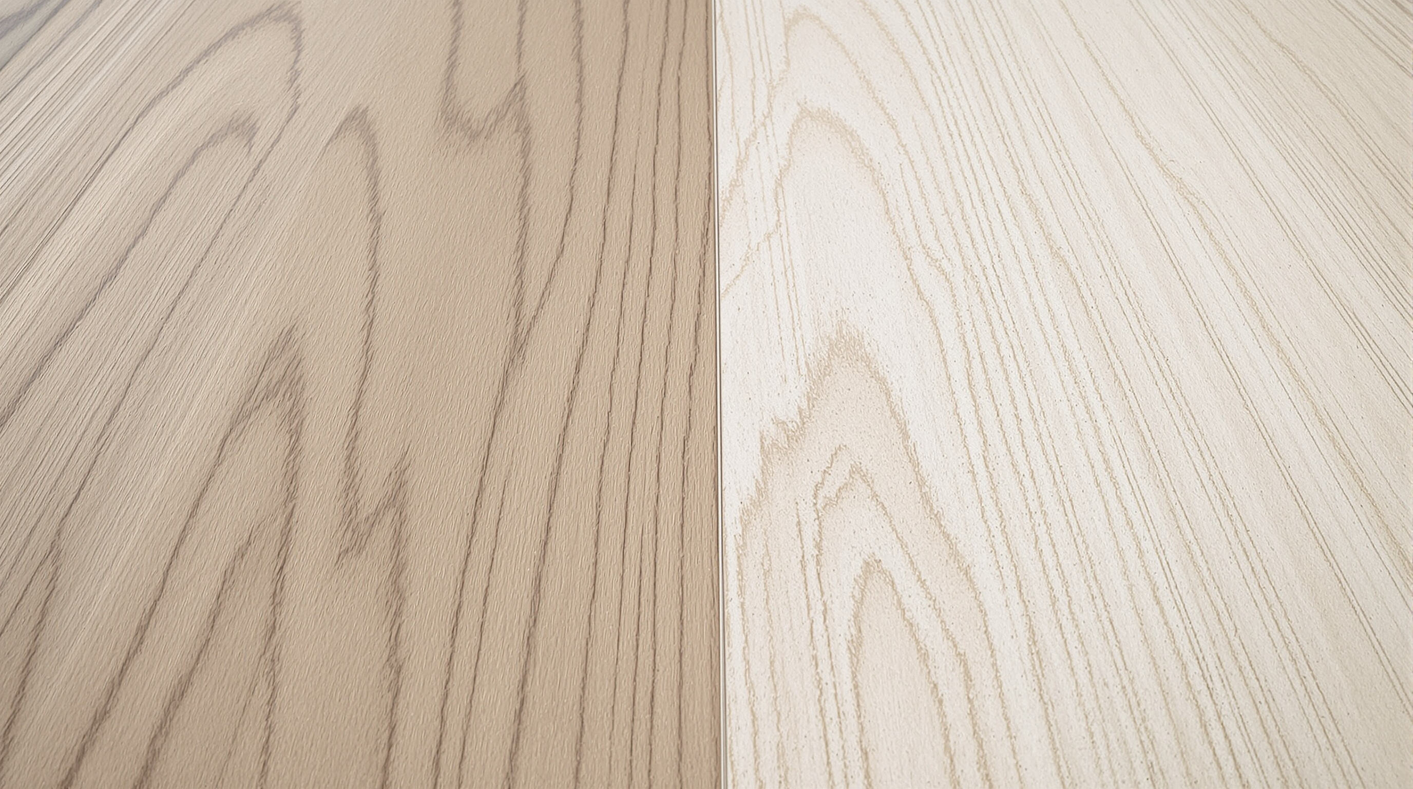 Close-up of LVT floor panels showing realistic wood and stone textures