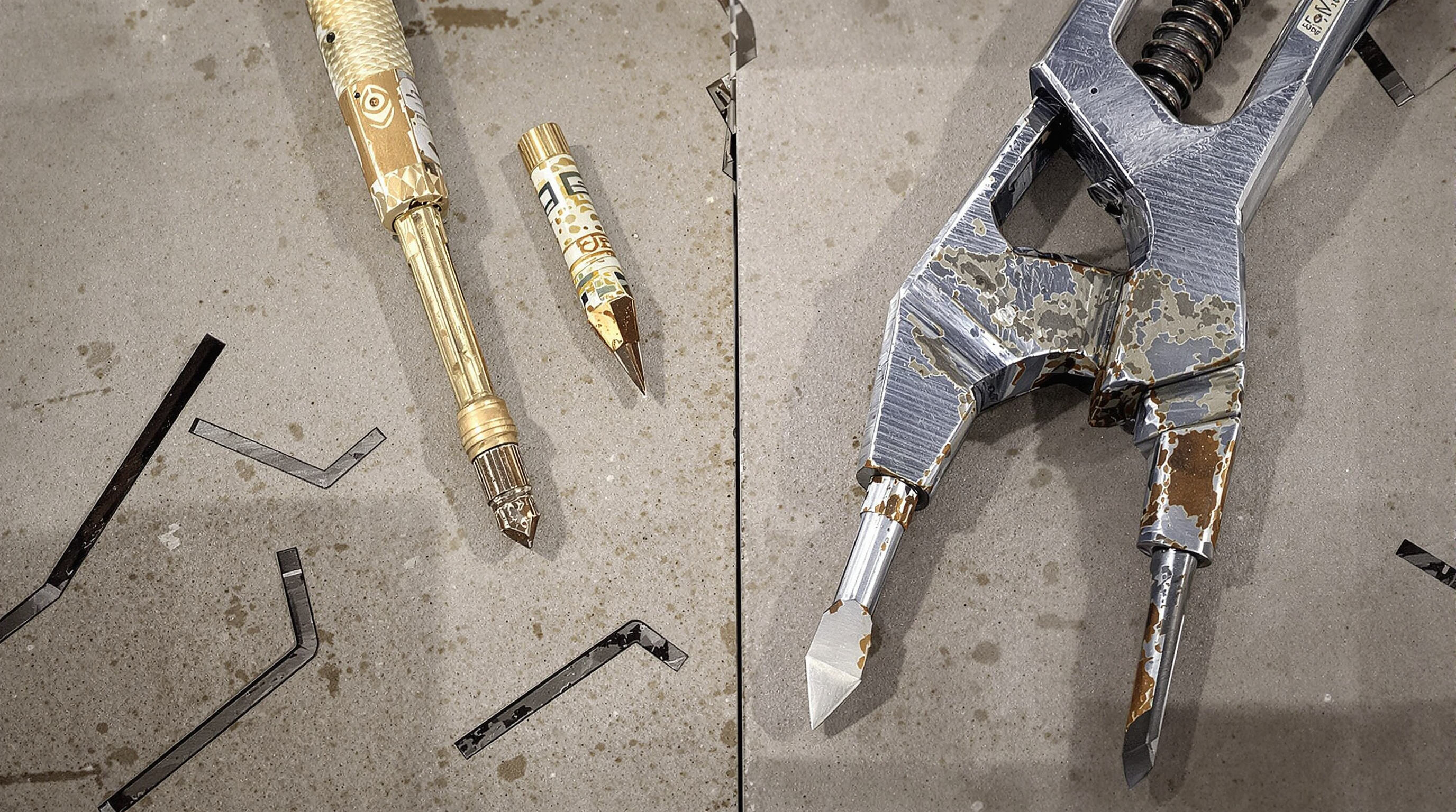 Close-up of advanced SPC cutting tools beside worn traditional tools, highlighting durability and wear differences on rigid flooring