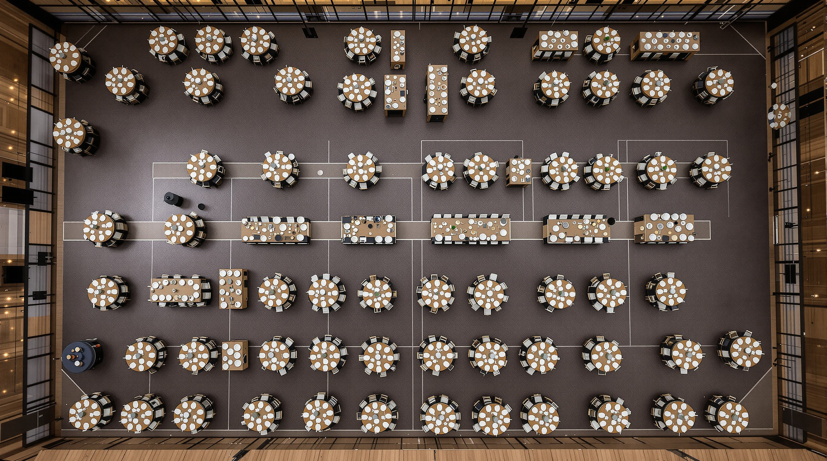 Banquet venue layout featuring varied table shapes and spacious aisles to demonstrate optimal space utilization and flow.