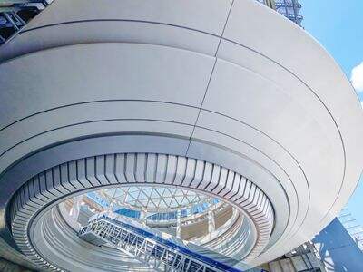 How a specialshaped metal curtain wall Can Tell a Building's Story