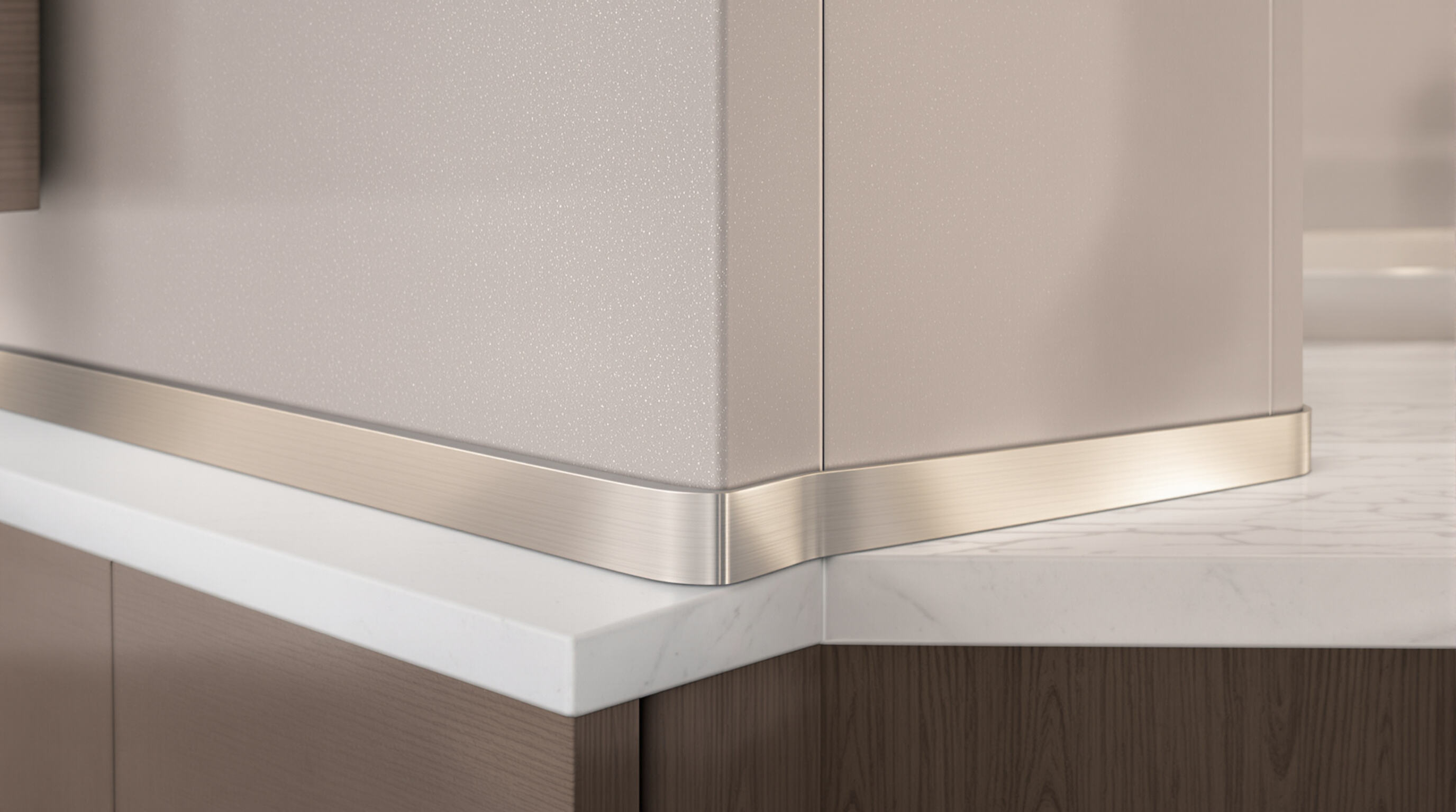 Kitchen and bathroom spaces highlighting stainless steel strips used as edge protectors and decorative trim