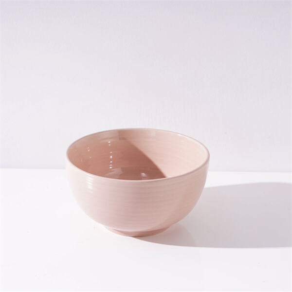 The vibrant pink hue of the ceramic bowl is sure to brighten up your kitchen.
