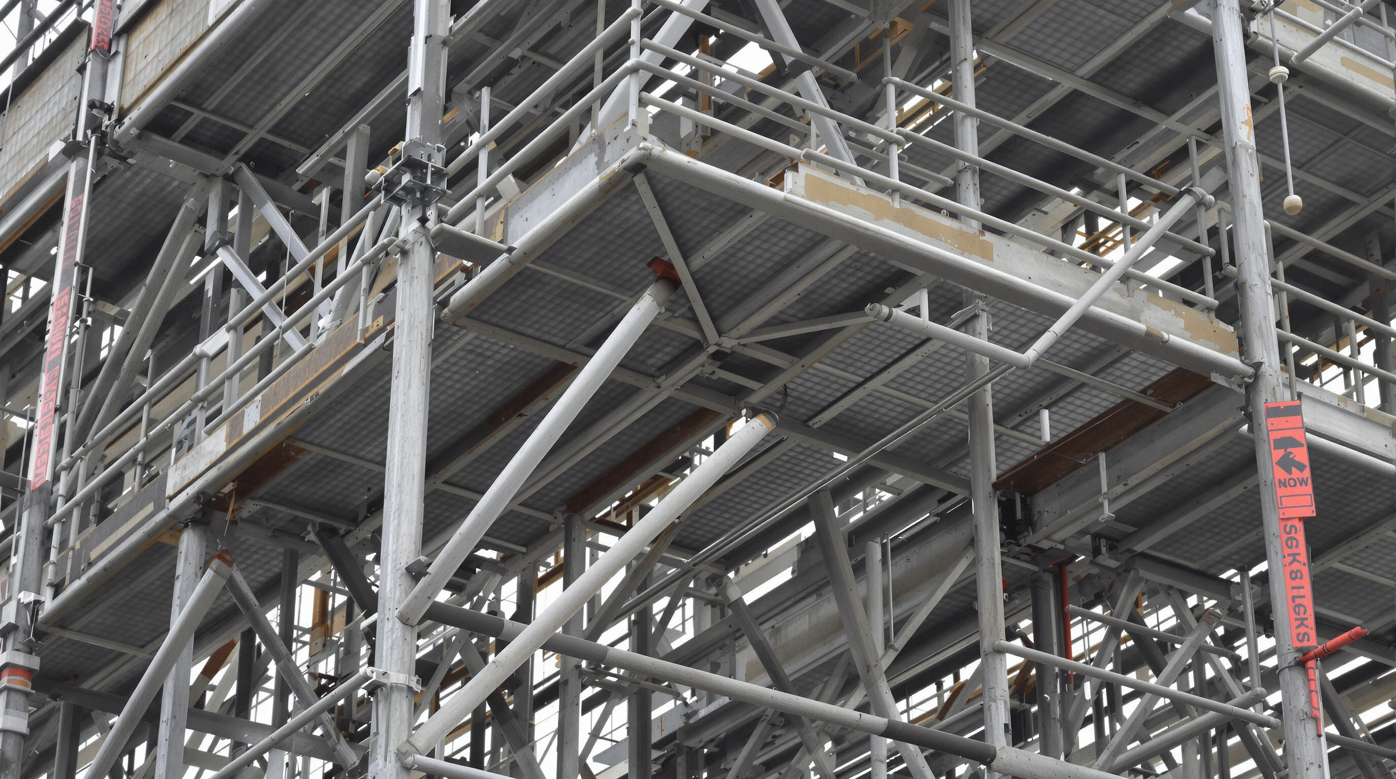 Close-up of scaffold structure showing steel braces and joints for stability