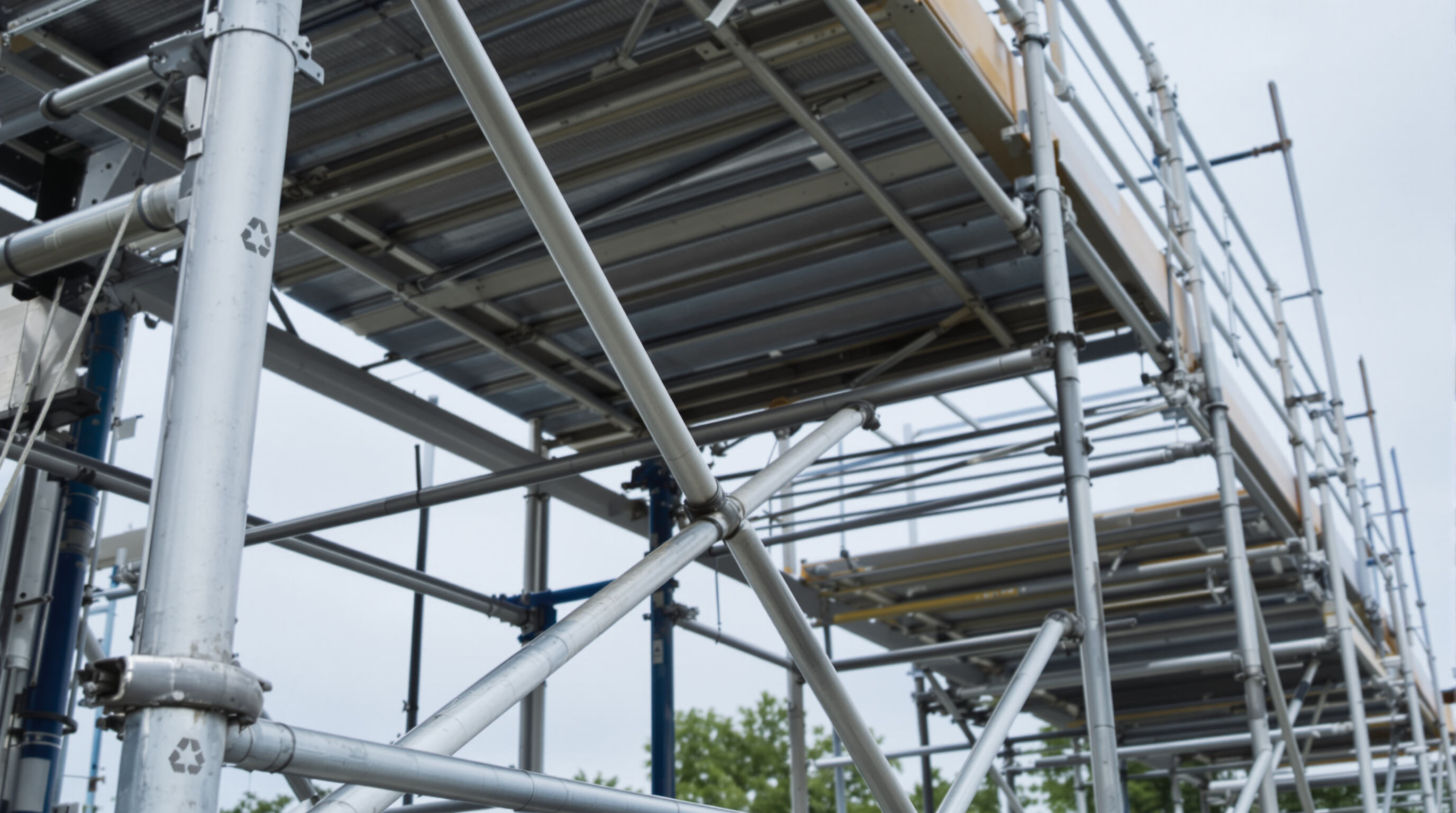 Steel and aluminum frame scaffolding displayed outdoors, emphasizing durability and environmental sustainability