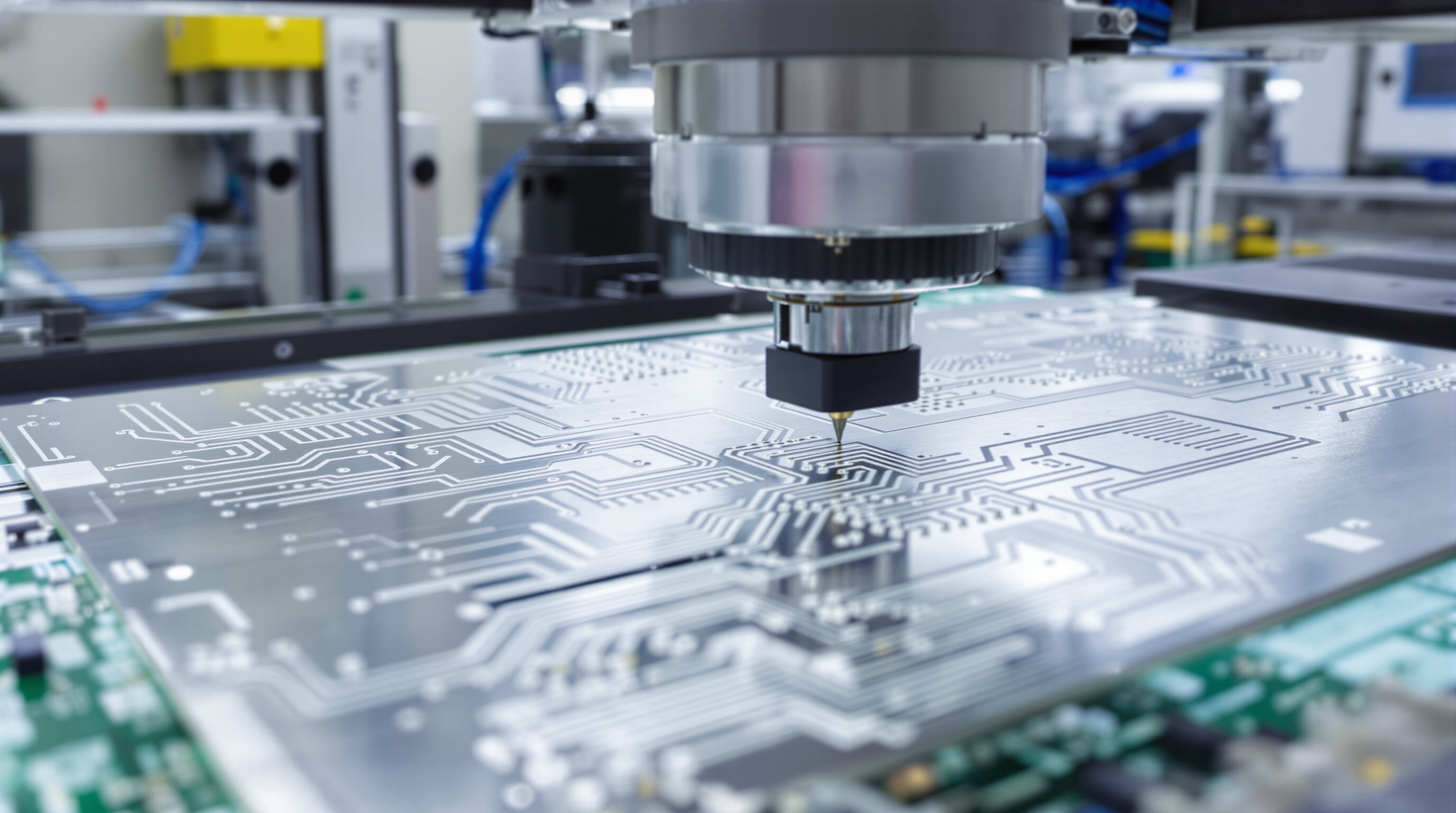 Automated stencil printer depositing solder paste on a PCB in a factory environment