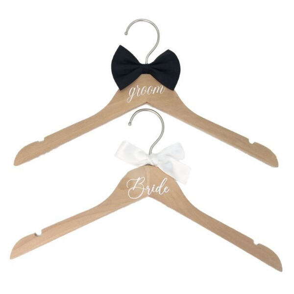 Safely hang your precious wedding dress on a sturdy bride dress hanger.