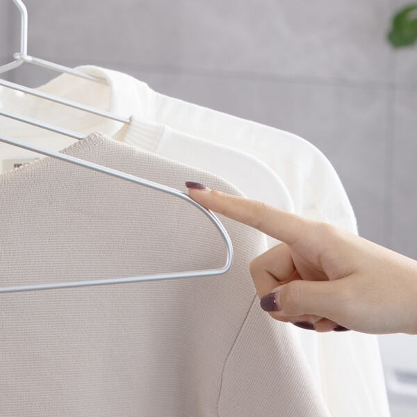 Keep your clothes wrinkle-free with a convenient free standing clothes hanger