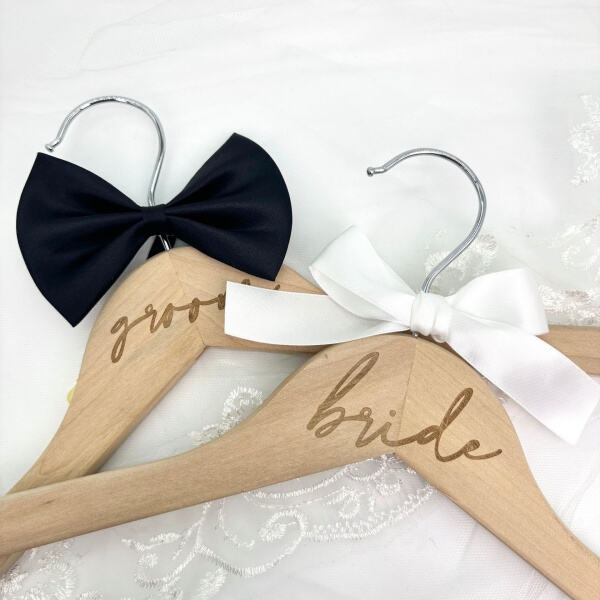 Add a special touch to your bridal attire with a customized bride dress hanger.