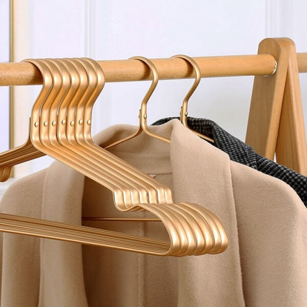 Keep Your Clothes Looking Chic on Gold Hangers