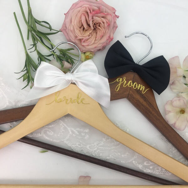 Complete your bridal ensemble with a chic and stylish bride dress hanger.