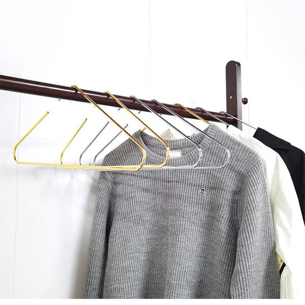 Add a Touch of Glamour to Your Home Decor with a Gold Coat Hanger