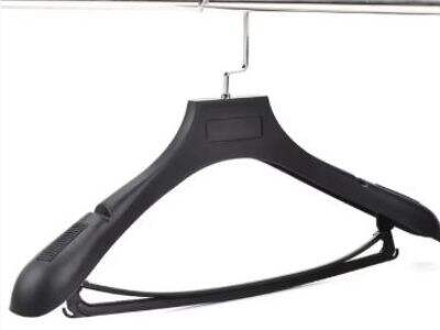 Why Curved Wooden Hangers Are Essential for Suit Jackets