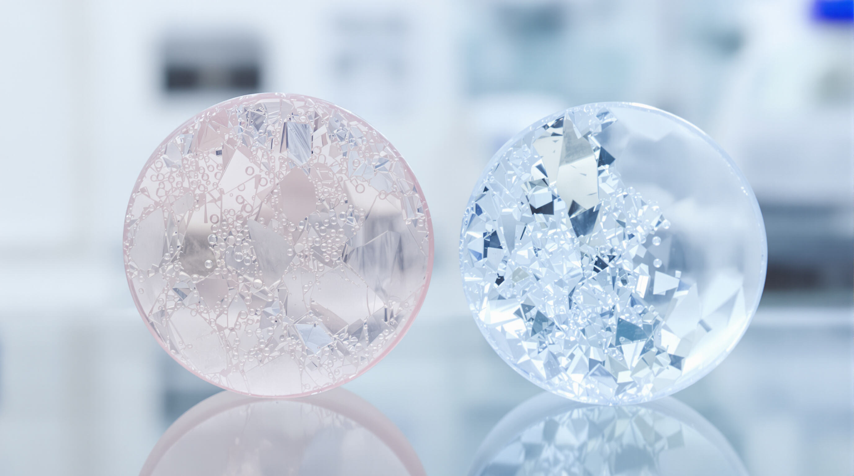 Close-up of two hyaluronic acid gel samples showing differences in structure and breakdown on a lab surface