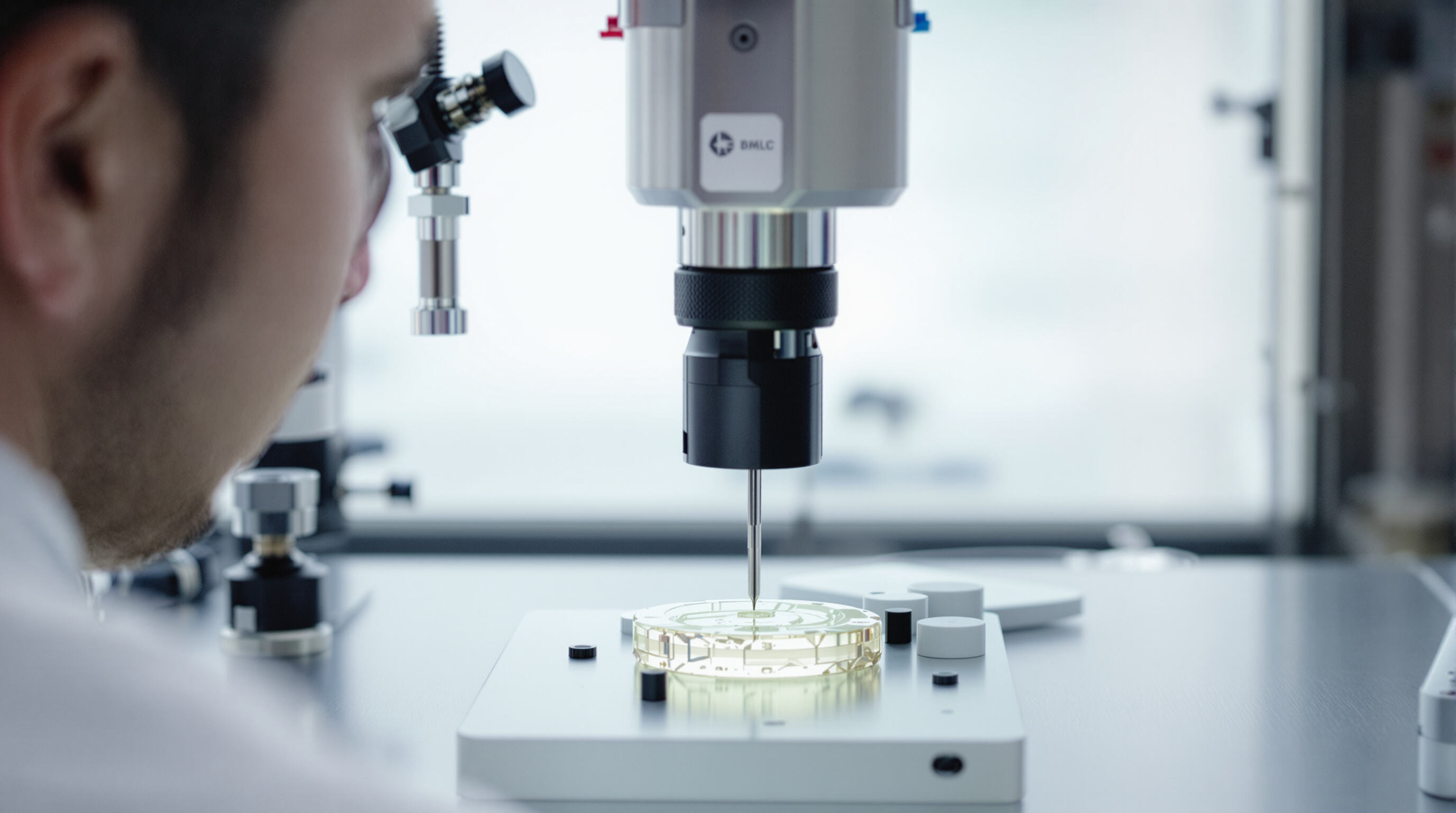 Scientist analyzes hydrogel with atomic force microscope and mechanical tester
