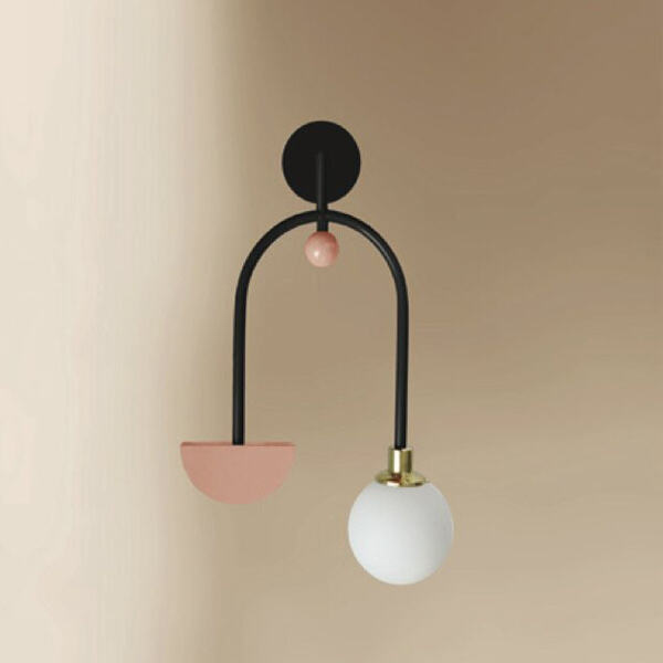 Create a cozy atmosphere with a wall sconce reading lamp