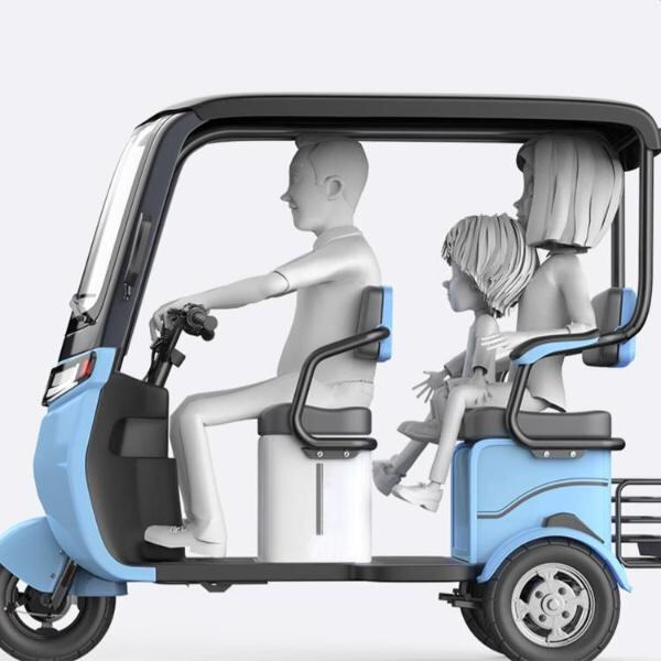 Utilisation d'un tricycle électrique pour deux adultes