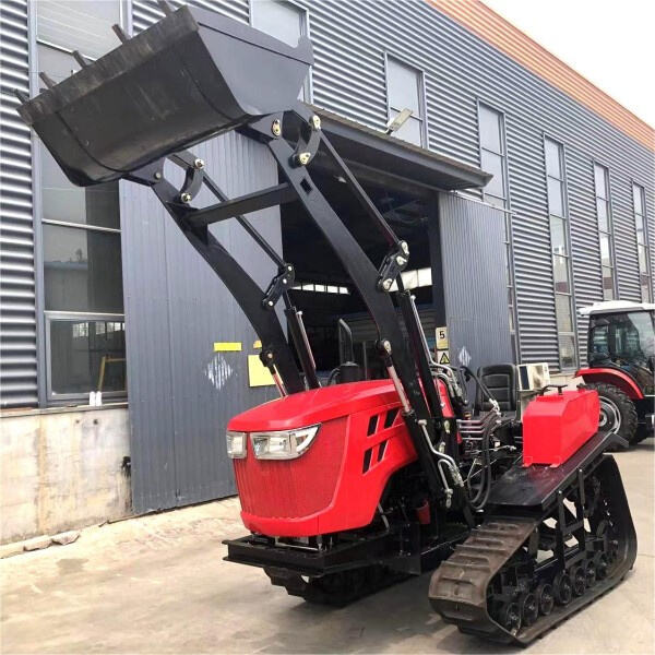 The tractor mini loader in action