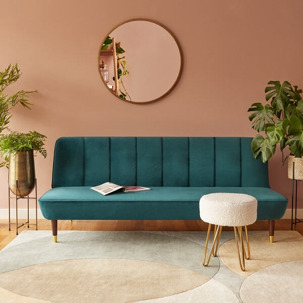 Create a cozy and inviting atmosphere with our environmentally friendly green sofa bed