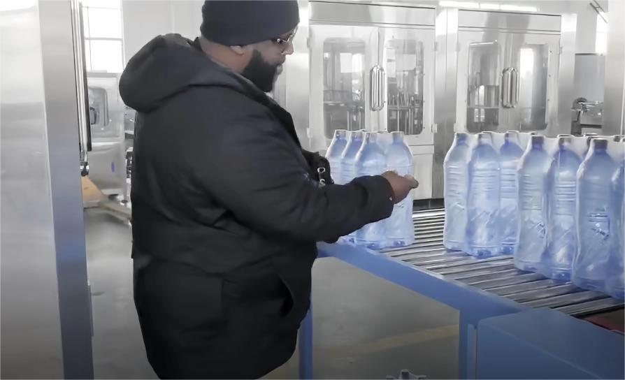 Guinea customer inspect  factory for 6000BPH bottled water production line