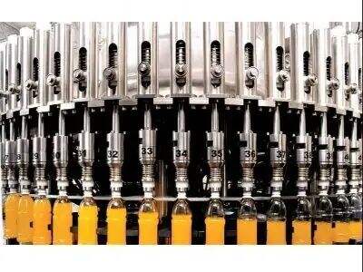 بناء ماكينة التعبئة: أجزاء مقاومة للتآكل للعصائر الحمضية