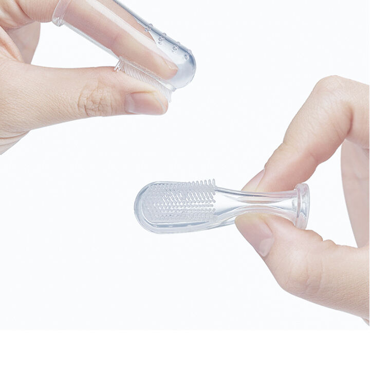 Transparent Baby Finger Toothbrush Silicone Finger Cover Baby Teething Oral Cleaning Tooth Brush BPA Free Baby Finger Toothbrush supplier