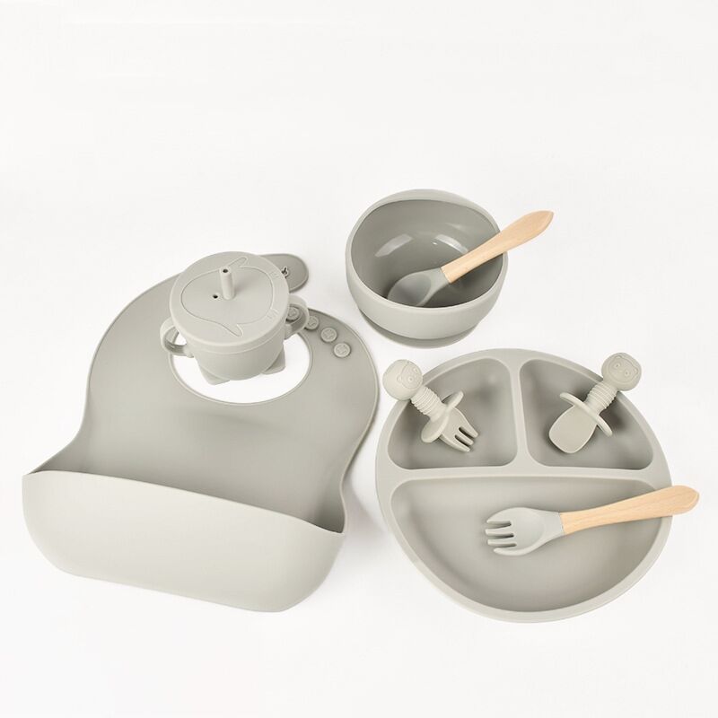 Factory BPA Free Feeding Tableware Set Food Grade Silicone 8 Pieces Baby Bib Spoon Fork Cup Bowl Plate Set for Kids manufacture