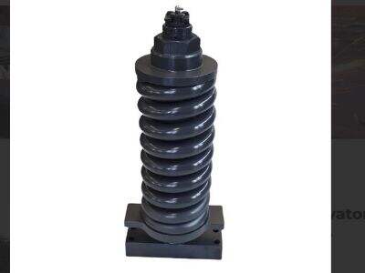 How a spring tensioning device assembly provides constant track tension